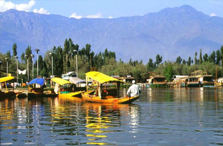 Panoramic view of Srinagar city with Dal Lake and surrounding Mughal gardens under Himalayas