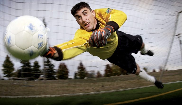 Soccer player demonstrating ball control and footwork during match play