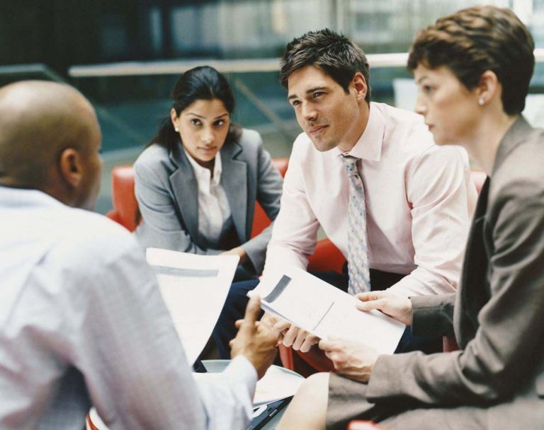 Desktop hero image illustrating key strategies for protecting a trading business from financial risk