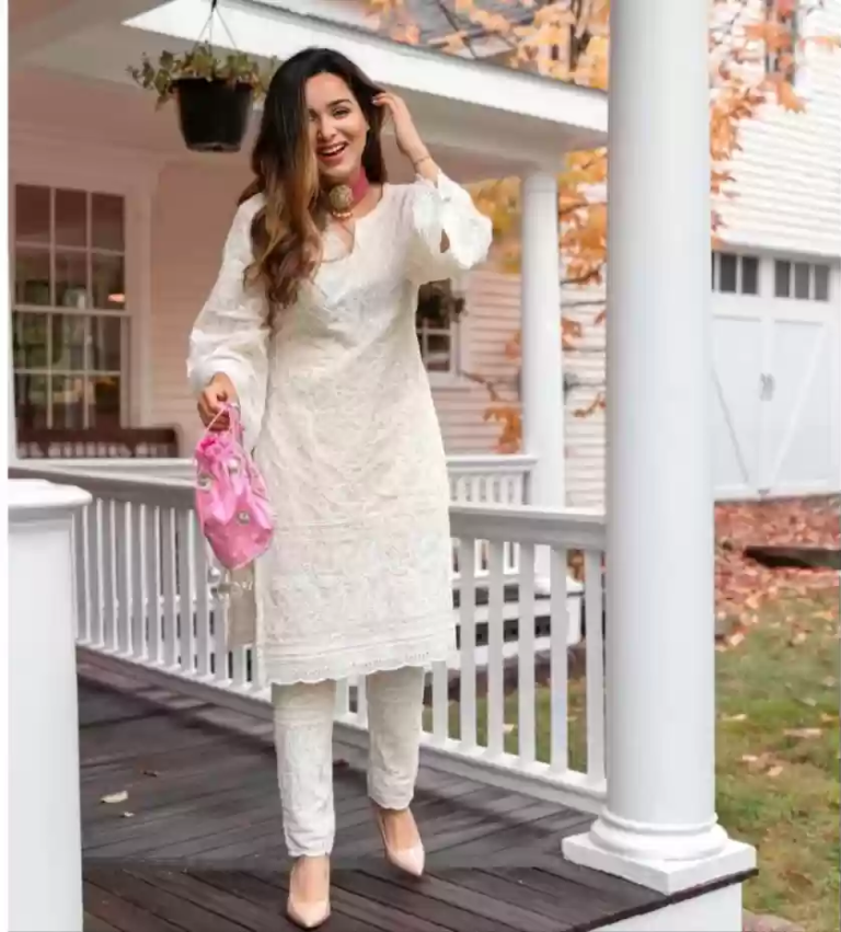 Woman wearing a stylish kurta pant set featuring traditional Indian prints and comfortable fit