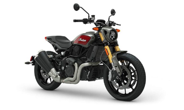 Side profile of a red and black 2024 Indian FTR 1200 motorcycle parked